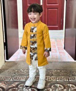 Set áo dài bé trai tết 2025 CT39A họa tiết cò hoa cúc cổ điển tone vàng sang trọng kèm quần kaki trắng cao cấp